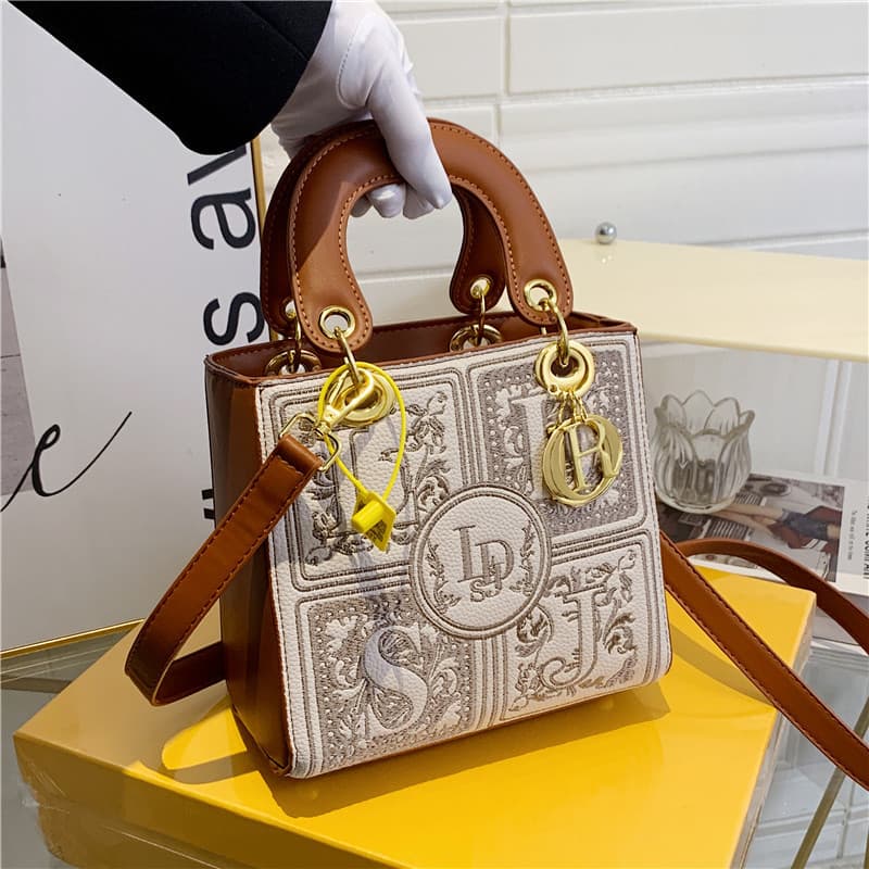 Niche design bag women's bag versatile 2026 new retro fashion embroidered bucket bag portable crossbody Princess Diana bag