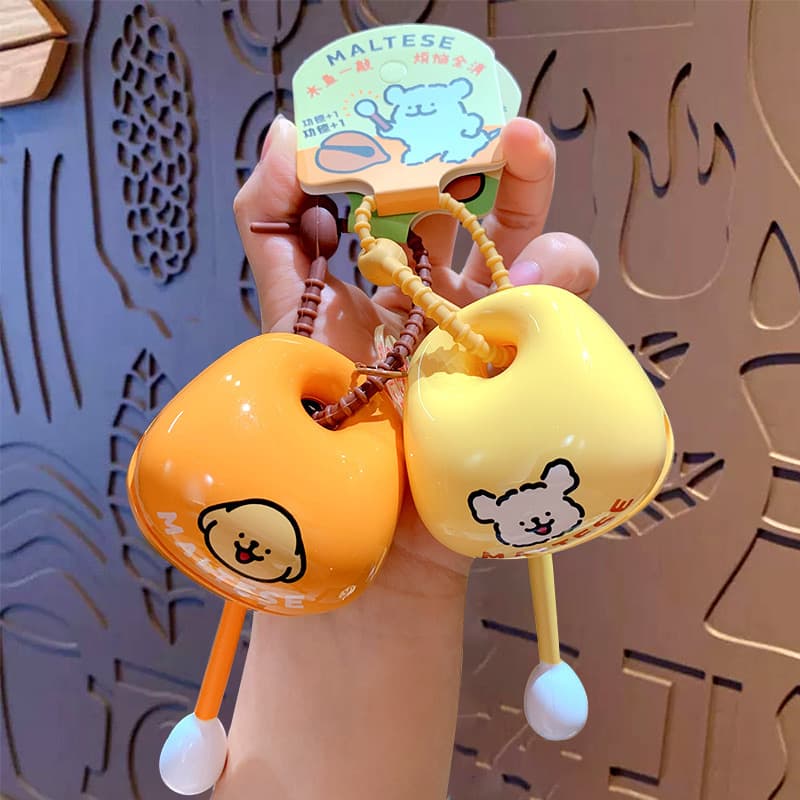 Cute line drawing of a puppy and wooden fish, a Buddhist-style tapping charm that adds merit and provides a healing and stress-relieving toy, keychain, or desktop ornament.