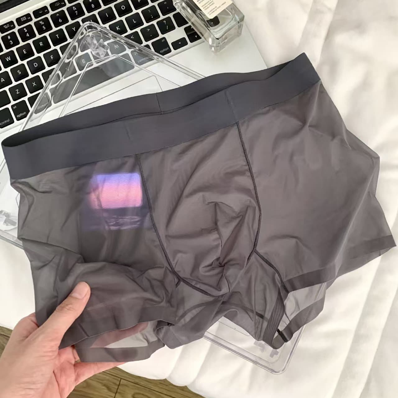 Hot Sale Men's Ice Silk Underwear Seamless Transparent Sexy Lightweight Breathable Invisible Boxer Briefs Summer Four-Corner Shorts