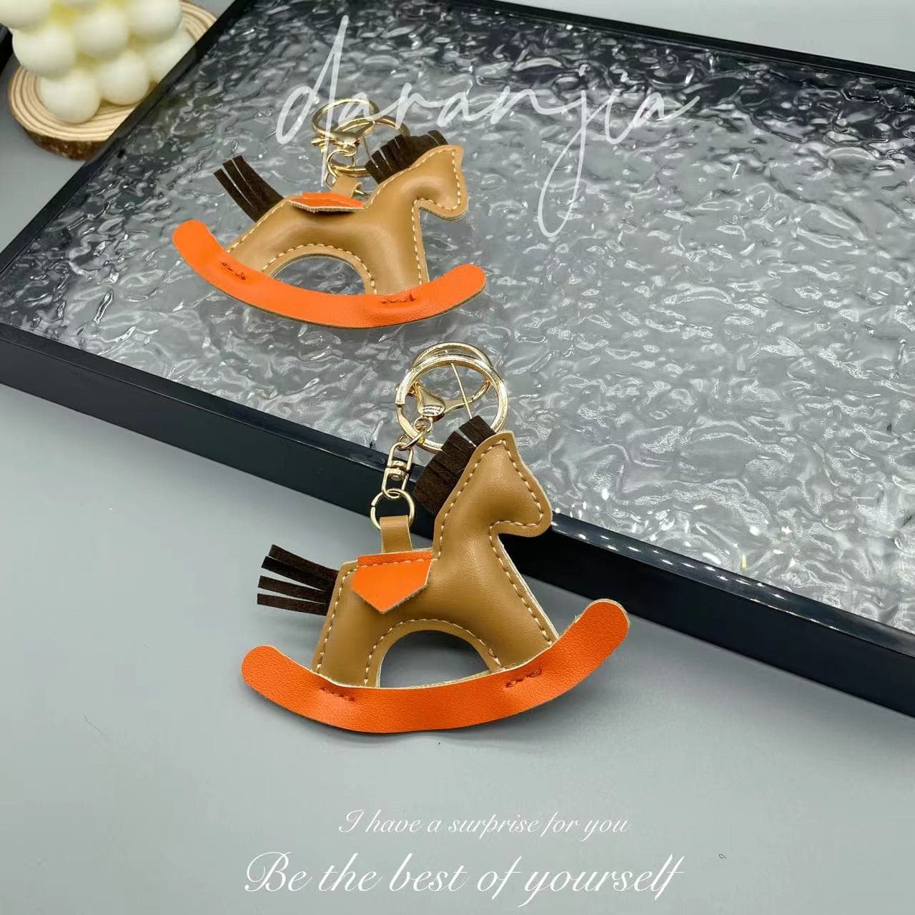 New cartoon color-blocking rocking horse PU bag pendant, high-end, fashionable and exquisite pony keychain, Trojan horse pendant