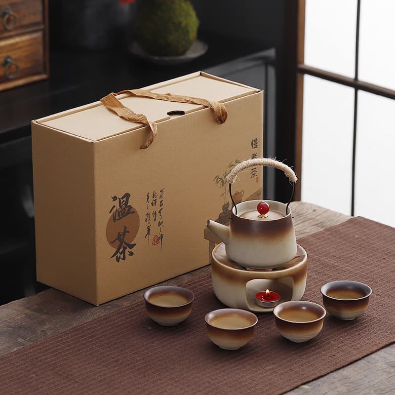 Stove-heated Kungfu tea set for home and outdoor use, open-fire warm pot with rustic clay lift handle as a gift