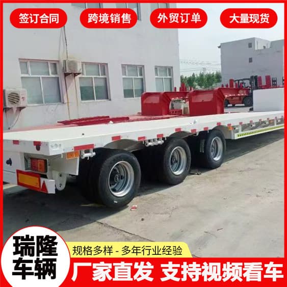 Large equipment transport vehicle low flatbed semi-trailer hook machine board hydraulic climbing ladder semi-trailer large equipment transport vehicle