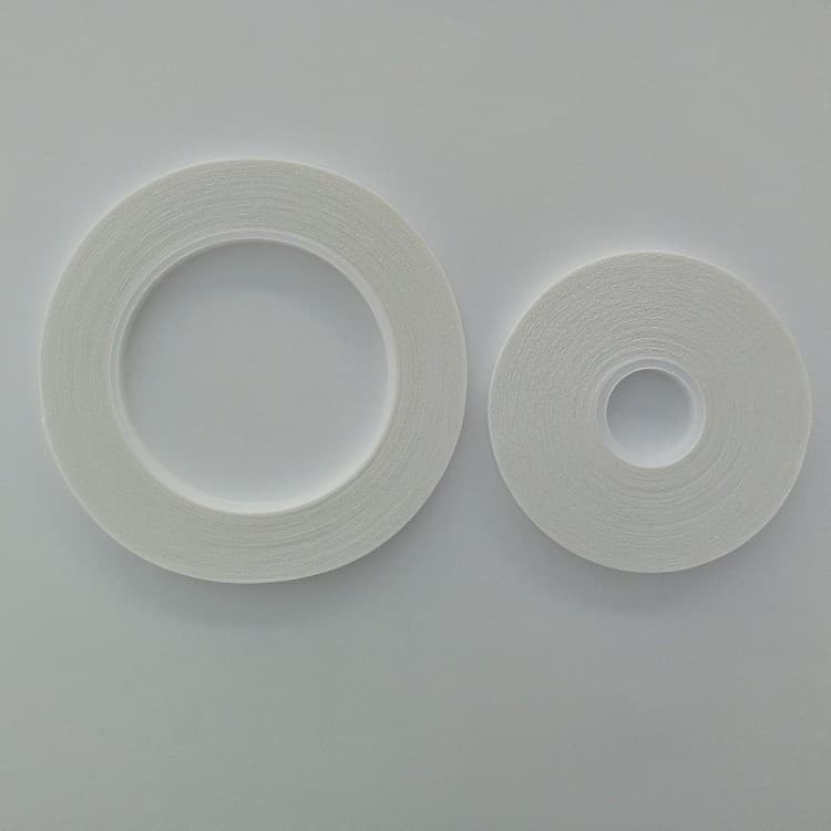 Water-soluble double-sided adhesive for fabric, patchwork embroidery, acetate fabric zipper temporary fixation, sewing machine use, dissolvable in water.