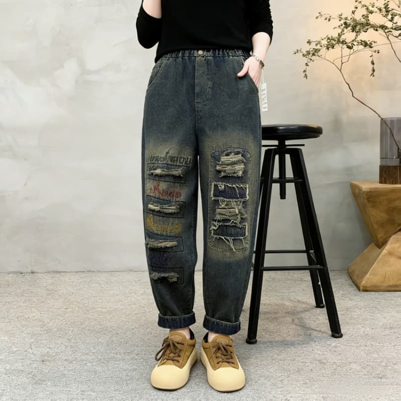 Trendy fashionable embroidered fake ripped denim harem pants 2026 spring retro style loose slim denim dad pants