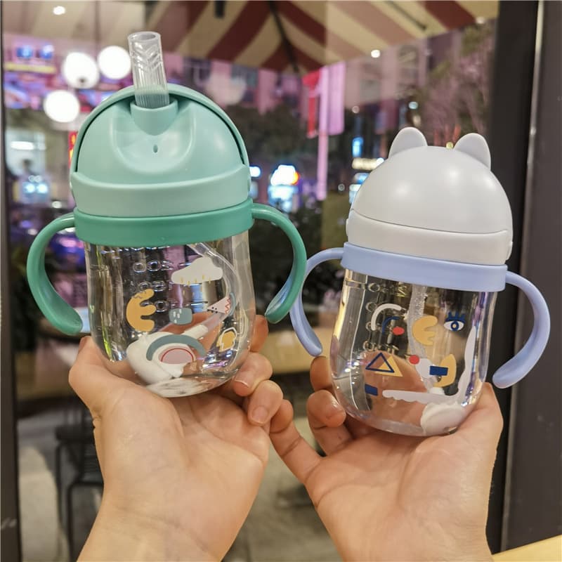 2023 Infant Bite-Spout Training Cup, Cute Cartoon Anti-Choke Gravity Ball Straw Cup with Handle