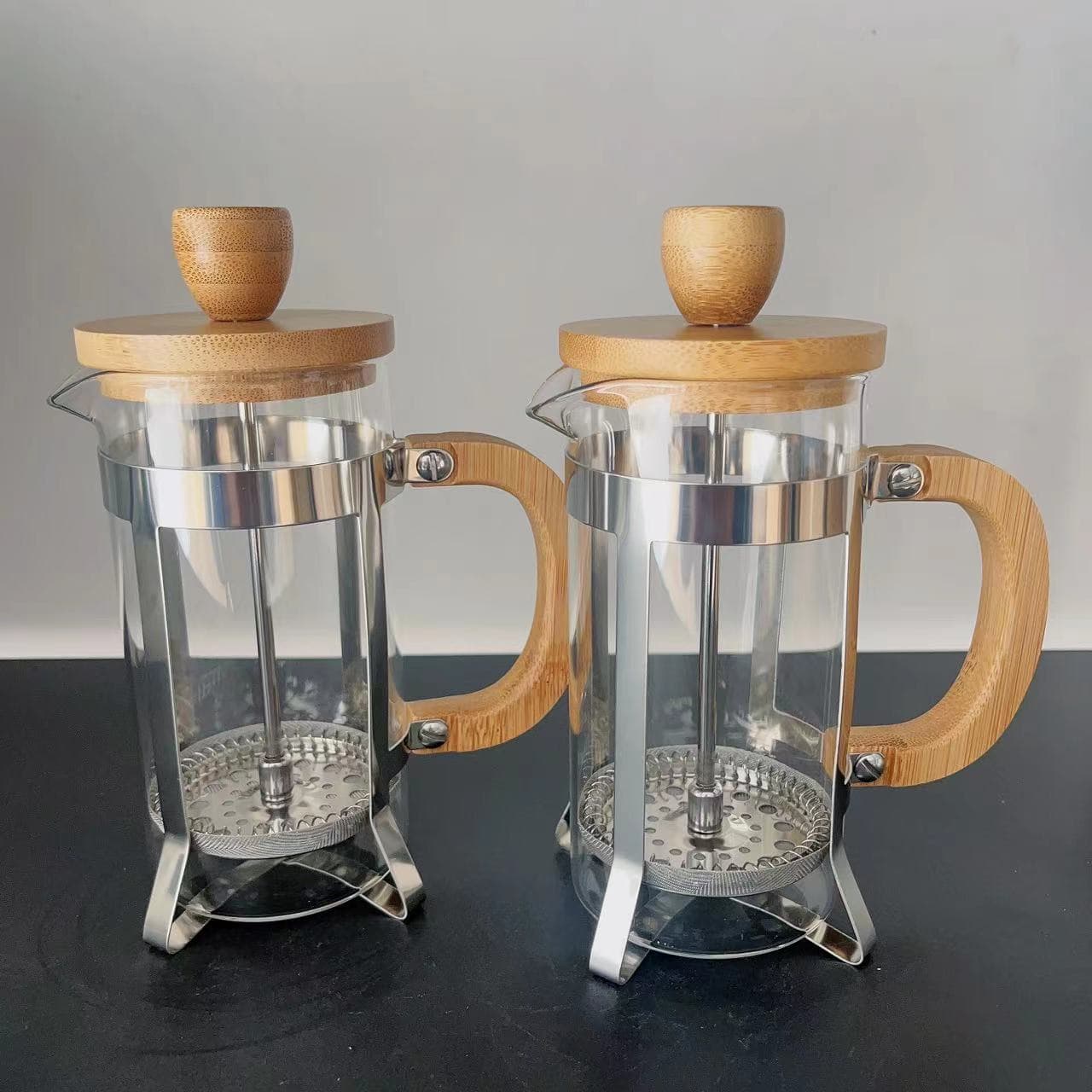 Home French press coffee maker, glass tea maker, hand-pressed filter cup, cold brew pot, bamboo and wood French press.