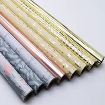 Rose Gold Aluminum Foil Stamped Gift Wrapping Paper Printed with Thickened Star, Dot, Stripe, and Geometric Patterns