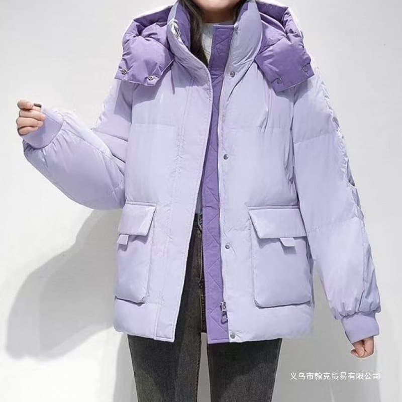 Women's color-blocked cotton-padded jacket with stand-up collar and hood, stylish and versatile, thick and warm, perfect for winter outings.