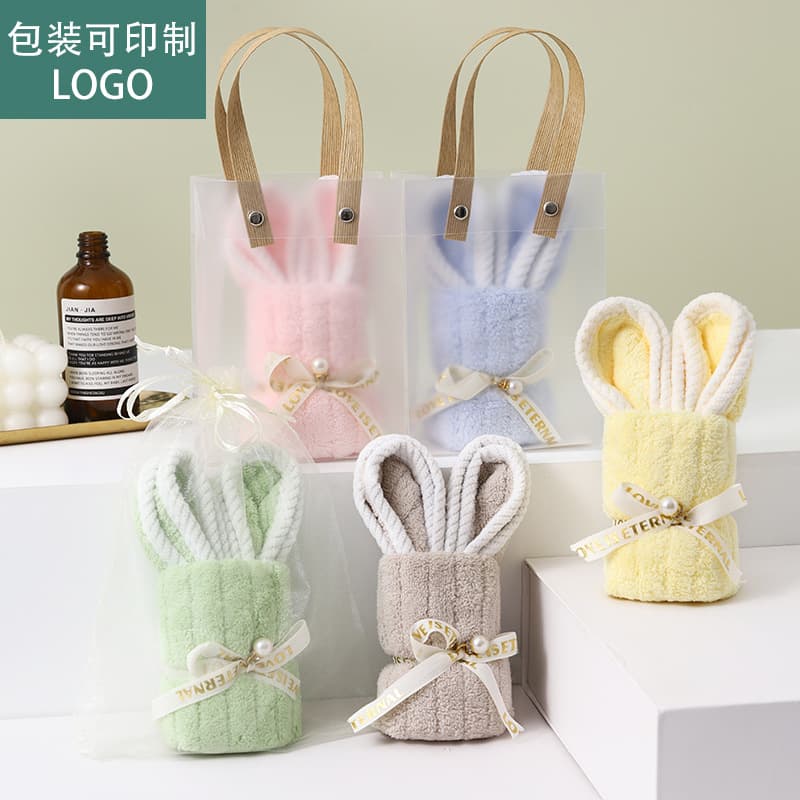 Cute bunny-shaped towels as a gift, birthday present, wedding favor, or creative opening gift for kindergarten.