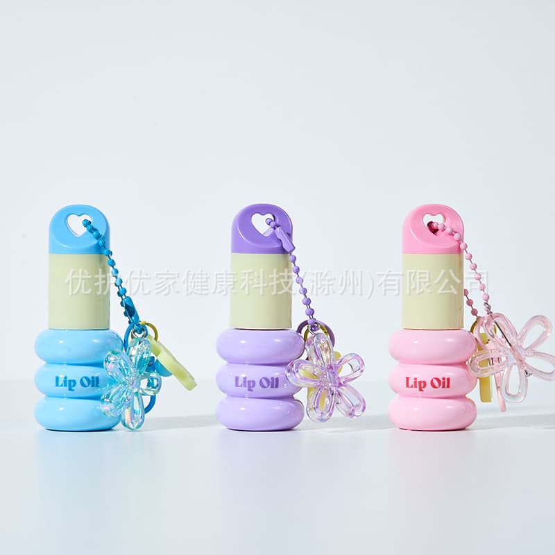 Foreign trade factory small gourd lip care oil lip essence oil moisturizing and moisturizing pouty lip care lip care cute lip balm