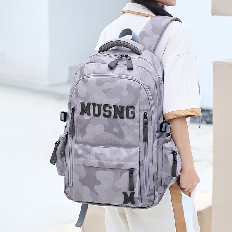 2026 new cross-border camouflage backpack men's fashionable, cool and versatile junior high school, high school student student travel backpack
