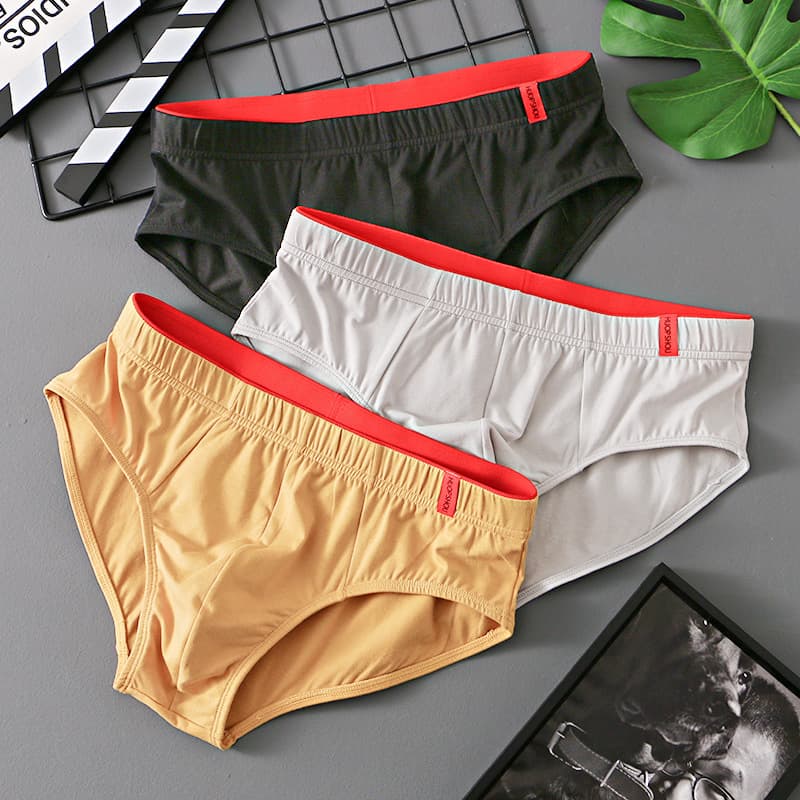 Wholesale direct solid color cotton men's briefs, mid-rise, trendy, breathable, drop shipping available.