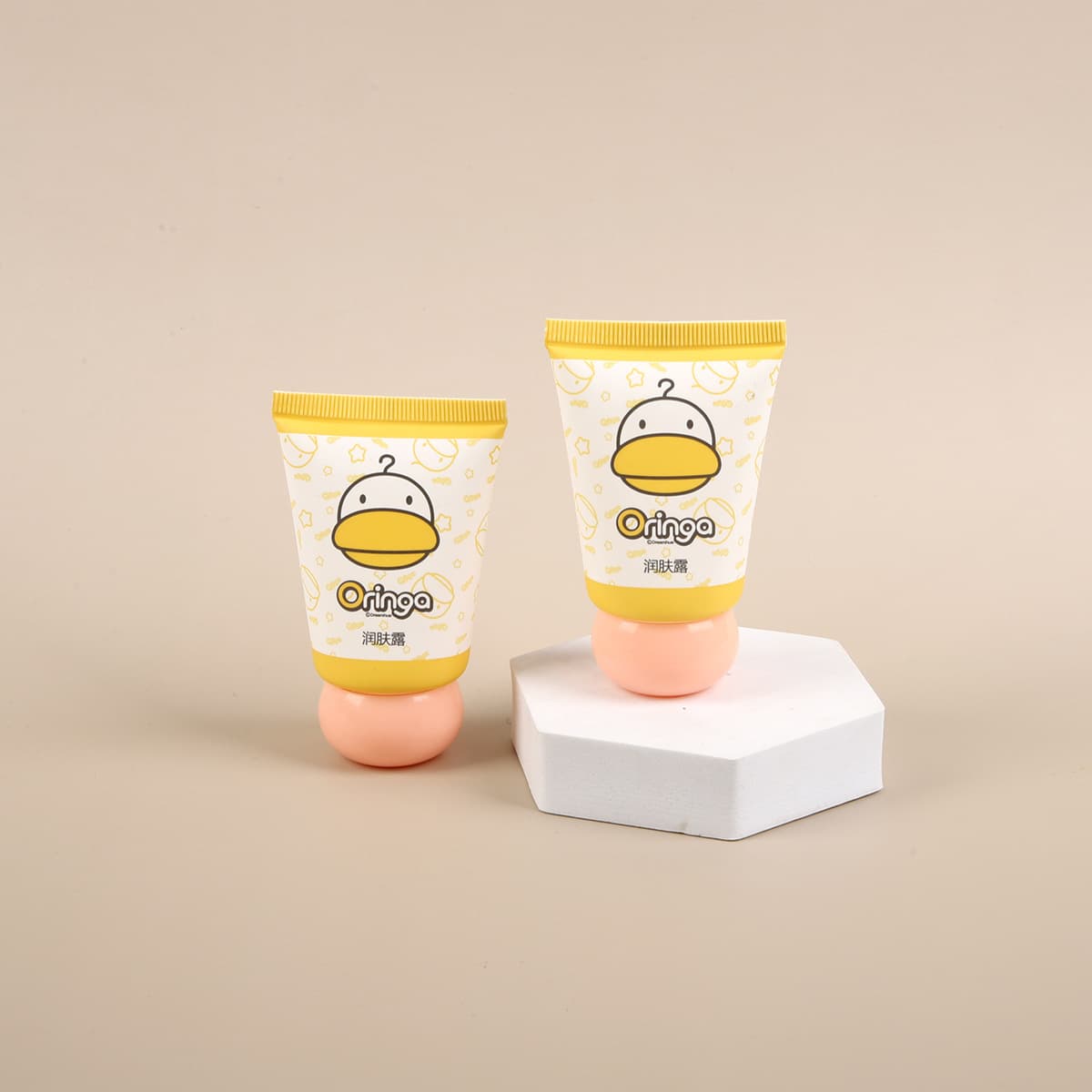 Mini chubby skincare tubes, perfume and hand cream tubes, cosmetic packaging materials, tubes from a cosmetics packaging factory.