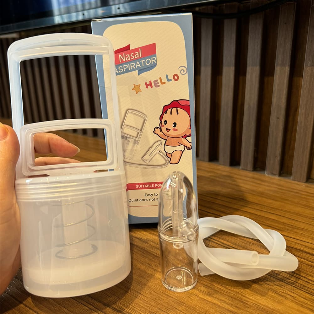 New style nasal aspirator for infants and newborns, a manual suction tool for relieving nasal congestion and removing mucus.