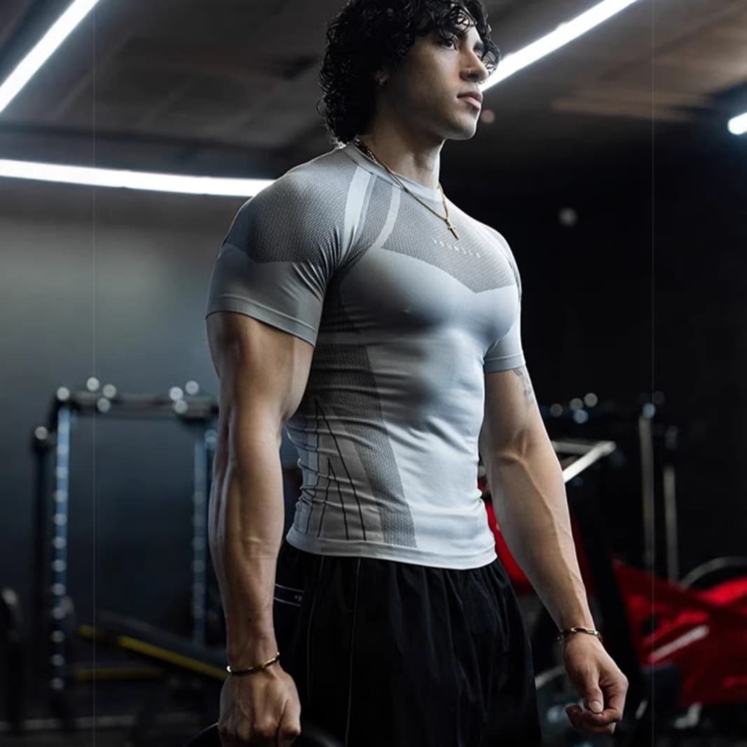 New fitness clothes coach sports t-shirt tights men's high elastic training clothes short-sleeved fitness clothes