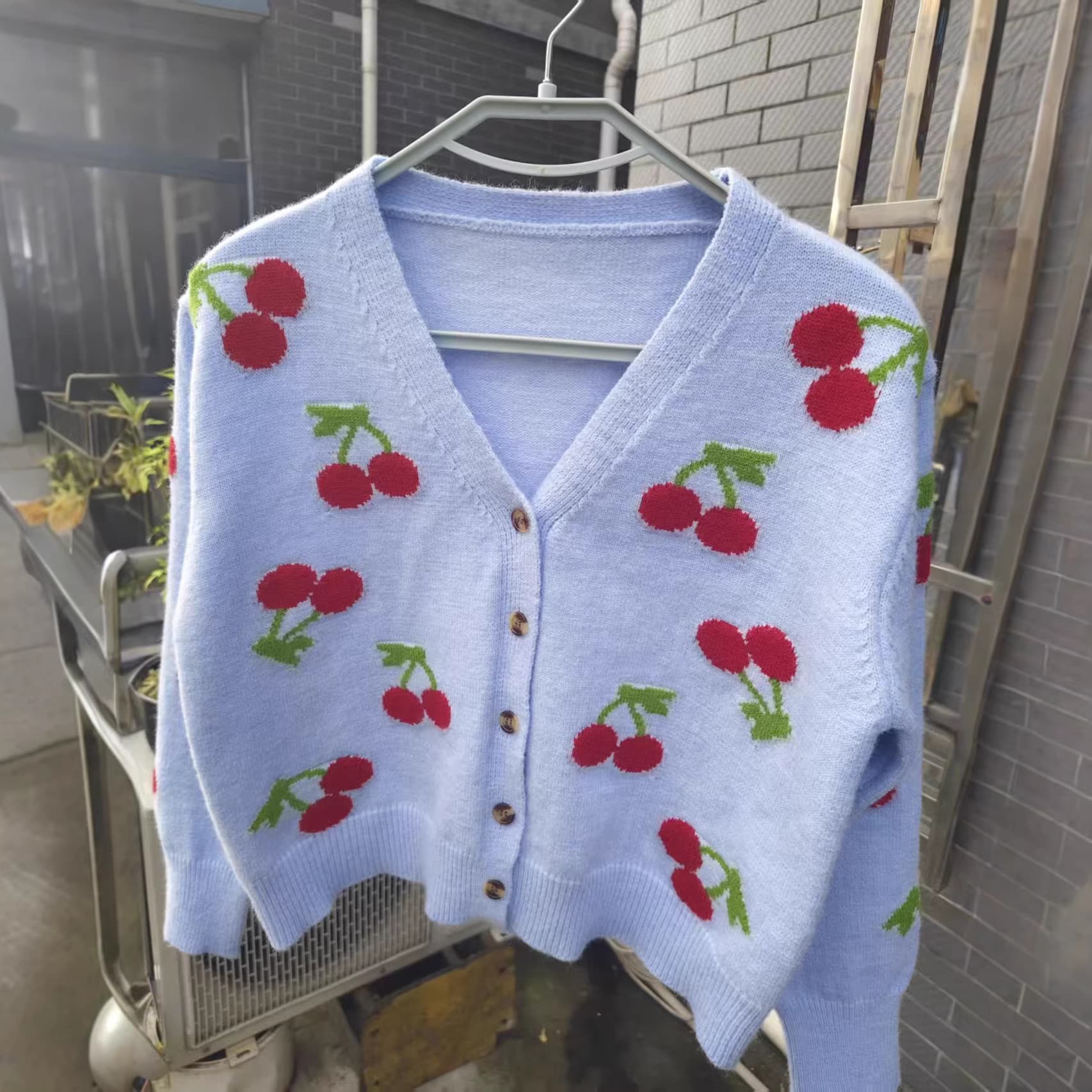 2026 French-style sweet and delicate embroidered cherry Merino wool V-neck knit cardigan that caught everyone's eye.