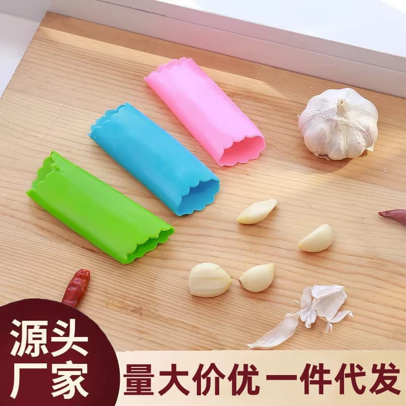 Home multi-functional garlic peeler, garlic skin remover, manual kitchen garlic clove peeler, and silicone skin remover.