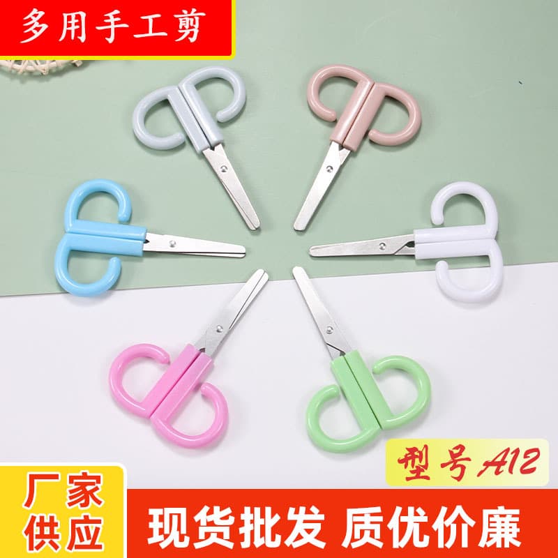 Factory direct stock of stainless steel safety scissors for students, household use, thread trimming, and baby food preparation.