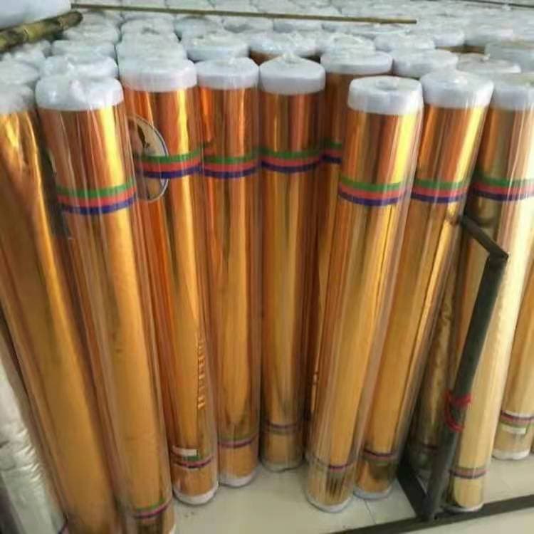 Gold metallic fabric material for wrapping trees and columns, gold and silver cloth for wedding advertising decoration, red and gold cloth stage backdrop.