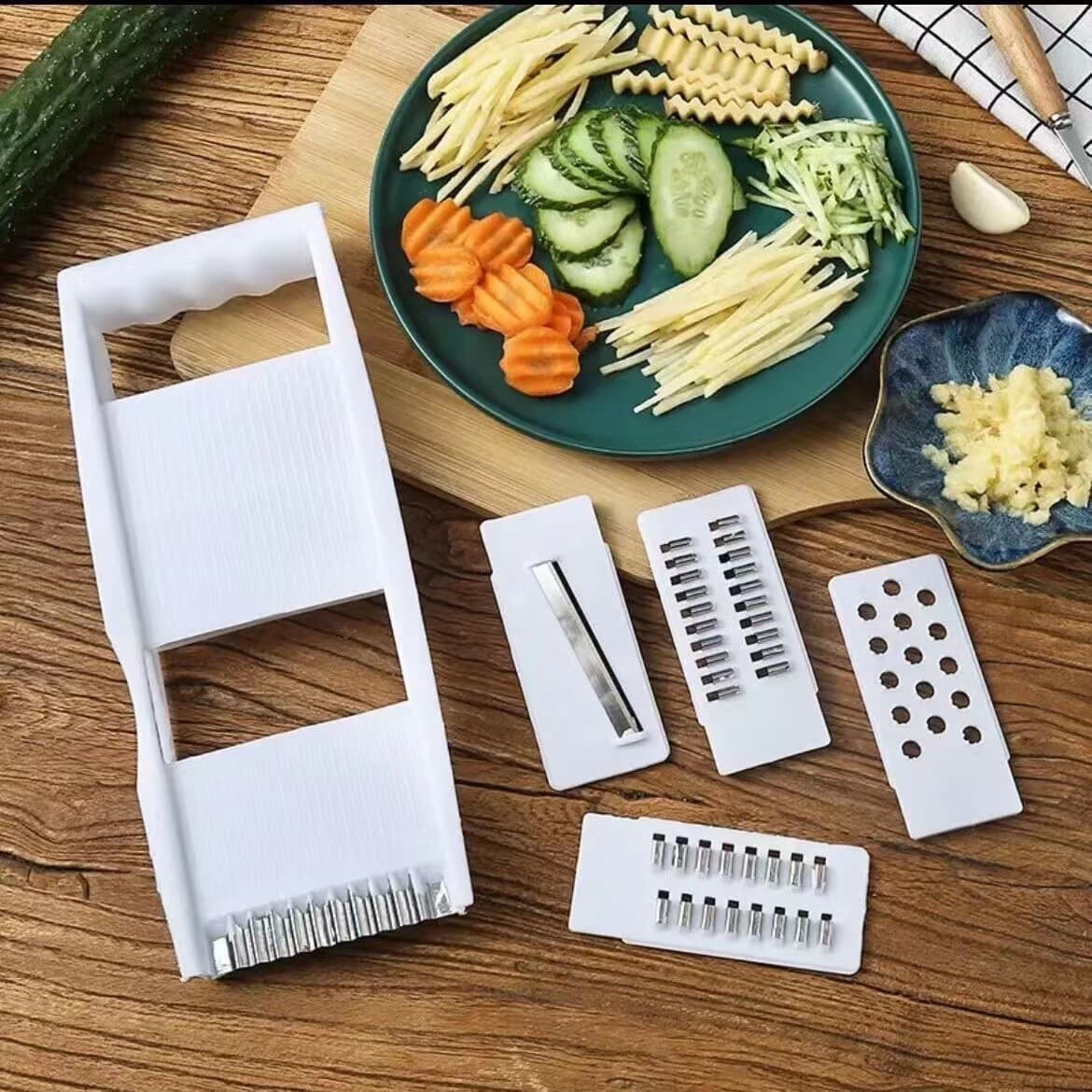 Stainless steel multi-functional vegetable cutter, potato shredder, slicer, hand protector, radish grater, kitchen essential.