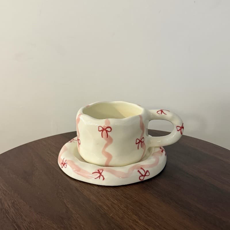 Korean Instagram style hand-shaped irregular ceramic fat coffee cup and saucer pure hand-painted bow tea cup and saucer cross-border