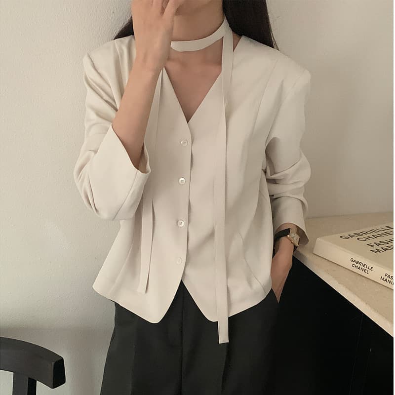 Chic Korean-style tie-waist blazer-style top.