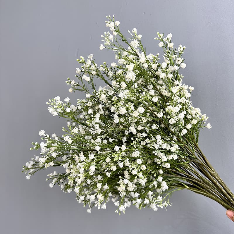 Wholesale artificial baby's breath flowers from a fresh-style manufacturer, fake flowers for floral arrangements, home decoration, wedding props, and bridal bouquets.