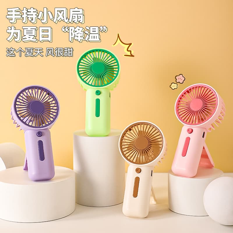 2025 New Cross-Border Handheld Mini Electric Fan, USB Rechargeable, Macaron AAA Battery, Portable Small Fan