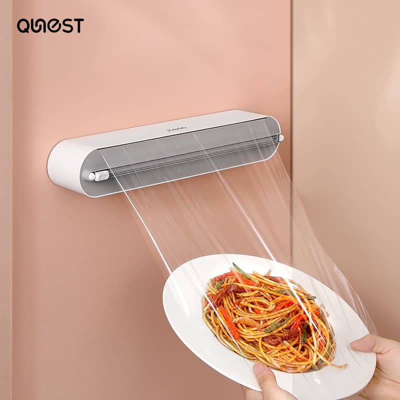 Kitchen disposable cling film cutter, household cling film cover, food-specific cutting box, magnetic fridge gadget.