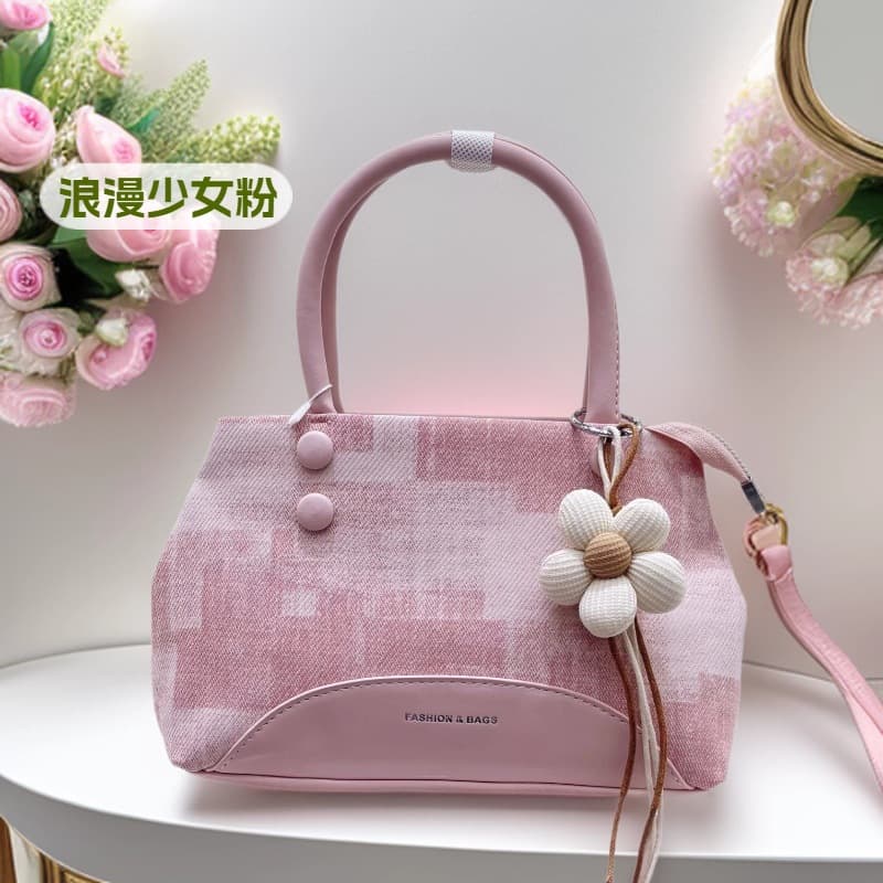 High-end niche bucket bag hand-held small bag 2026 spring new fashion versatile daily hand-carrying cross-body bag