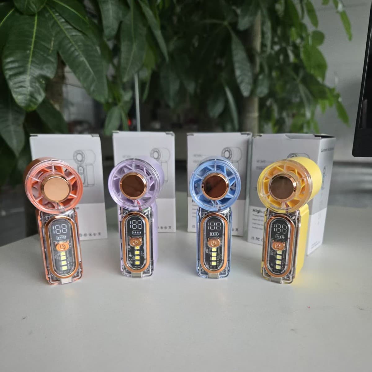 Cross-border hot model x699 mini handheld fan USB rechargeable LED light long-lasting turbo violent small fan