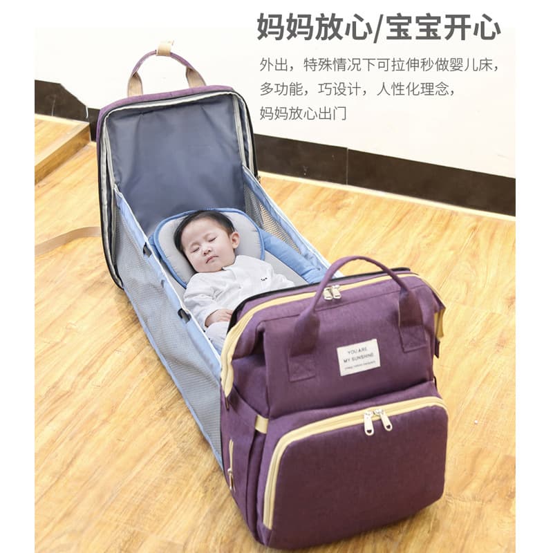 New portable folding bed/diaper bag, lightweight, large capacity, multi-purpose baby care bag.