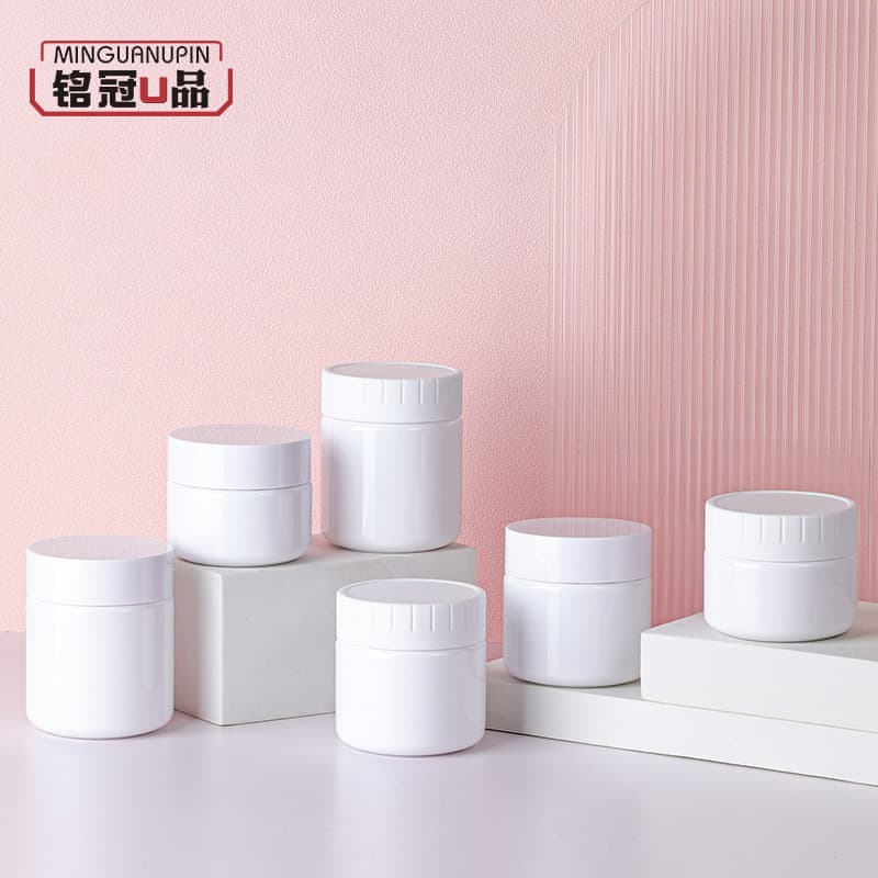 Manufacturer's customized packaging materials 100-120g scrub jar body lotion wide mouth bottle 60g matte white cover facial cream bottle