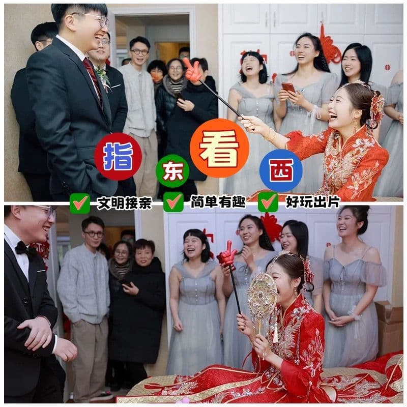 Props for the wedding mini-game, pointing east and west, the bride directing the groom to trick the groomsmen, a large hand thumb stick prop