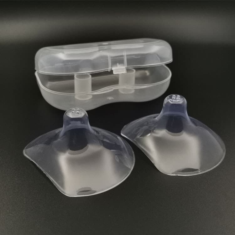Factory wholesale all-silicone nipple protectors, semi-circular four-hole breast pads, nursing pads, and other maternity and baby products.