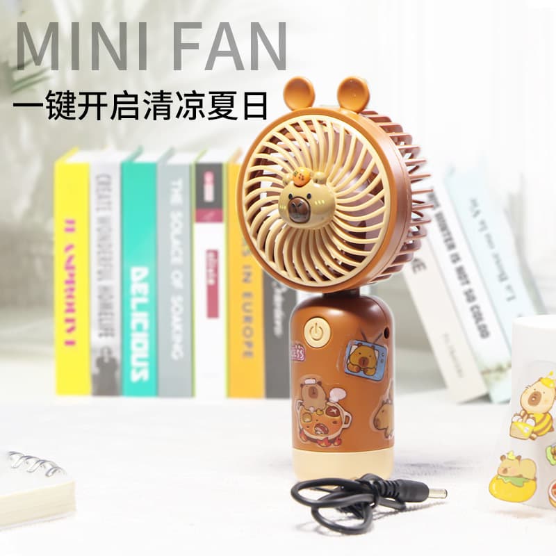 Cross-border handheld mini fan, USB rechargeable, high airflow, student portable capybara electric fan