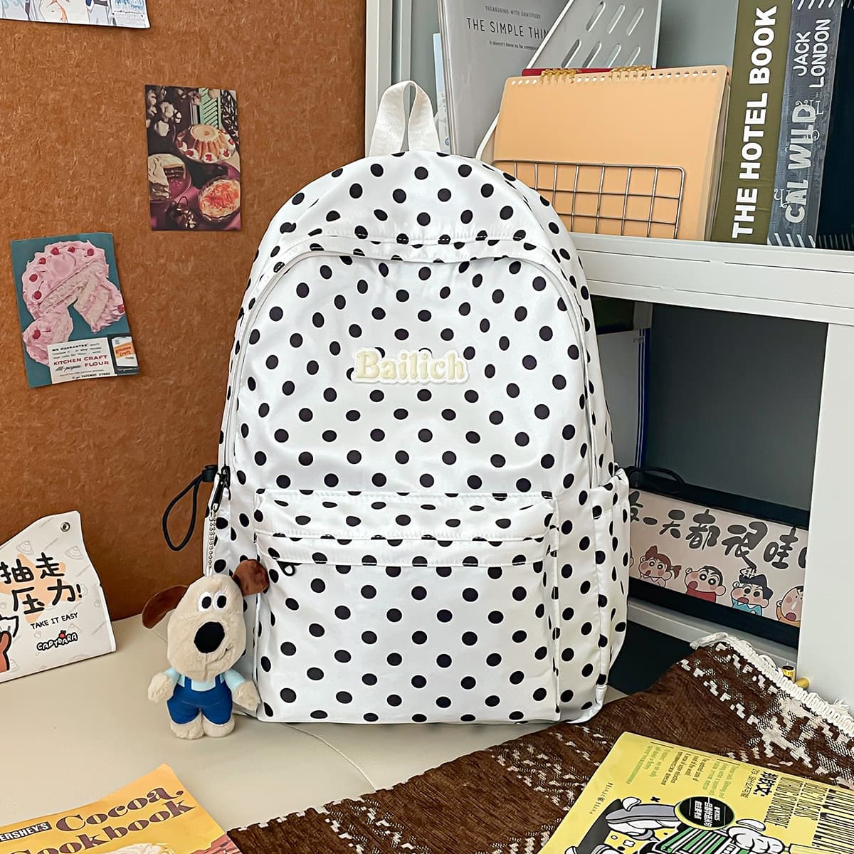 Japanese-style casual polka dot printed backpack for elementary, middle, and high school students, soft and lightweight school bag