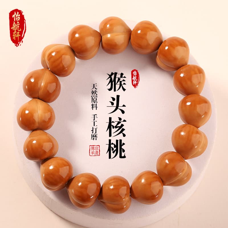 Monkey head peach hand strings, unisex gifts, wholesale cultural play pieces, direct sales from manufacturers of handmade accessories.