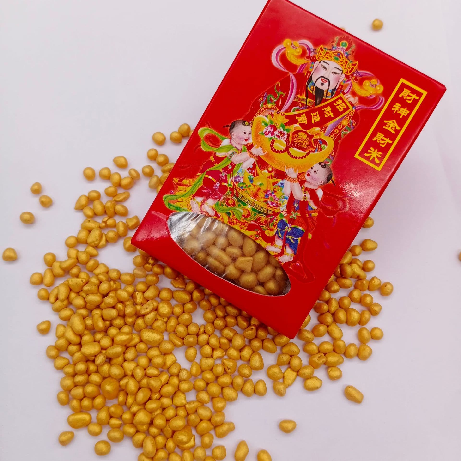Golden Wealth God rice in boxes, bulk, or bottles, with five-way wealth god rice, gold stones, and golden sand.