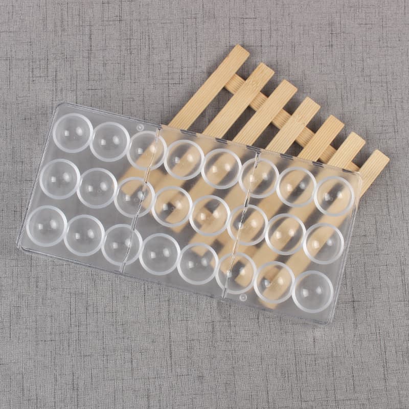 Zhenghui supplies factory direct sales of 24 consecutive round chocolate molds, plastic chocolate molds, jelly molds