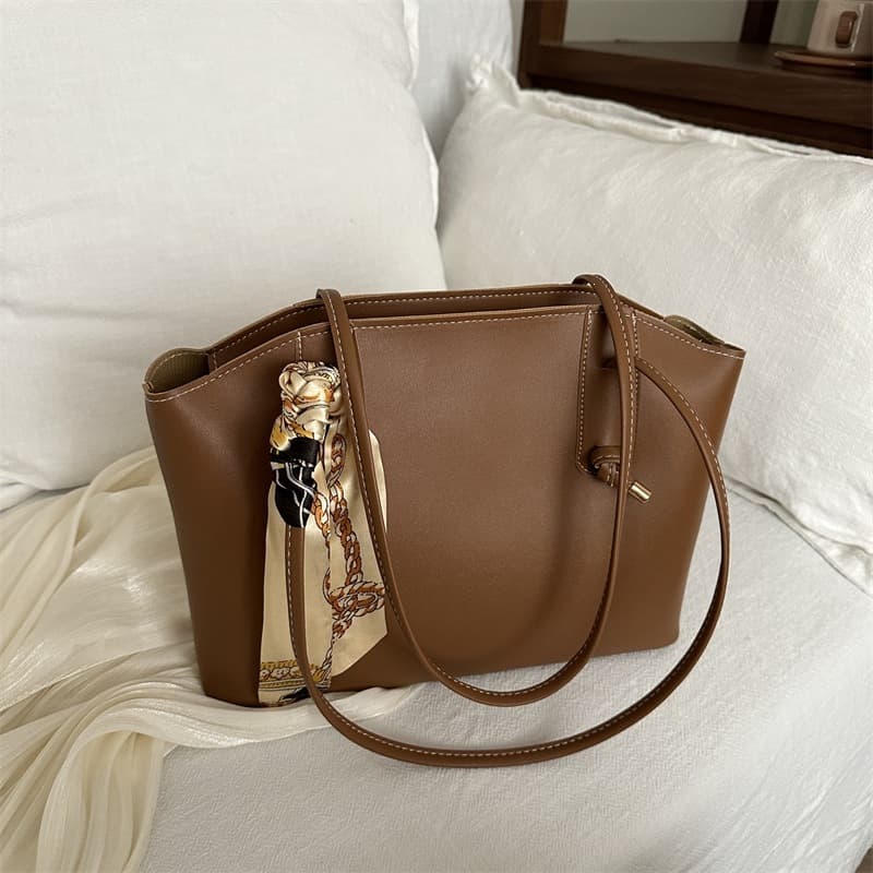 High-end silk scarf handbag 2025 spring new versatile ins shoulder armpit bag this year's popular tote bag