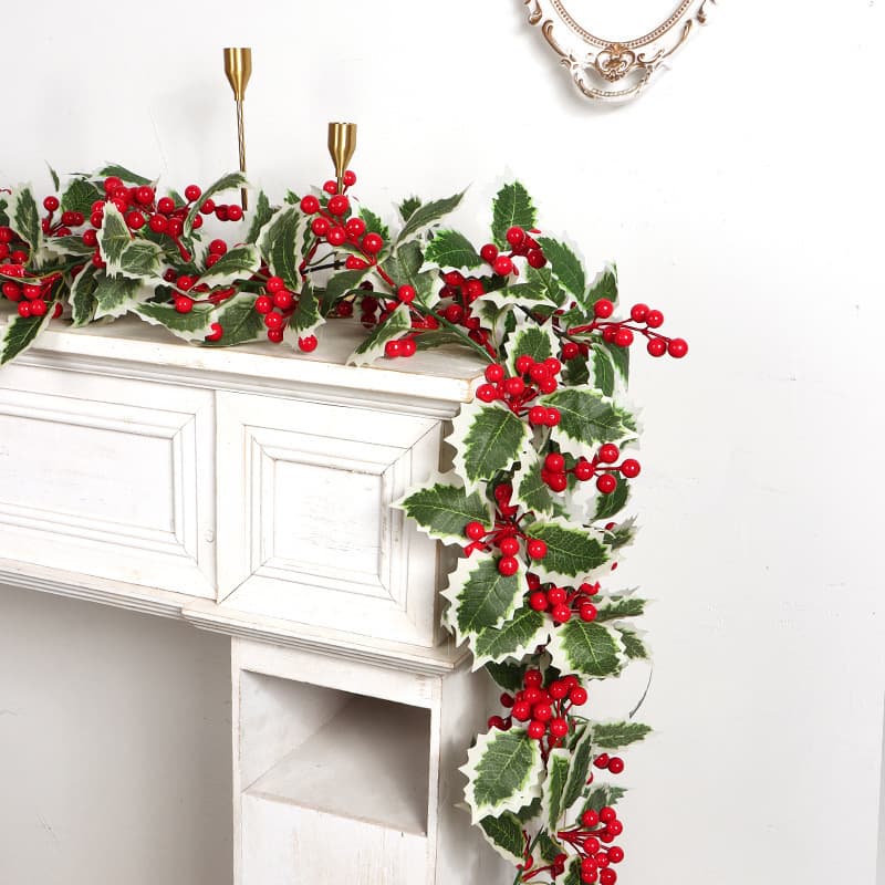 Cross-border exclusive supply of artificial Christmas tree with green leaves, red berries, vine ornaments, and PVC Christmas decorations.