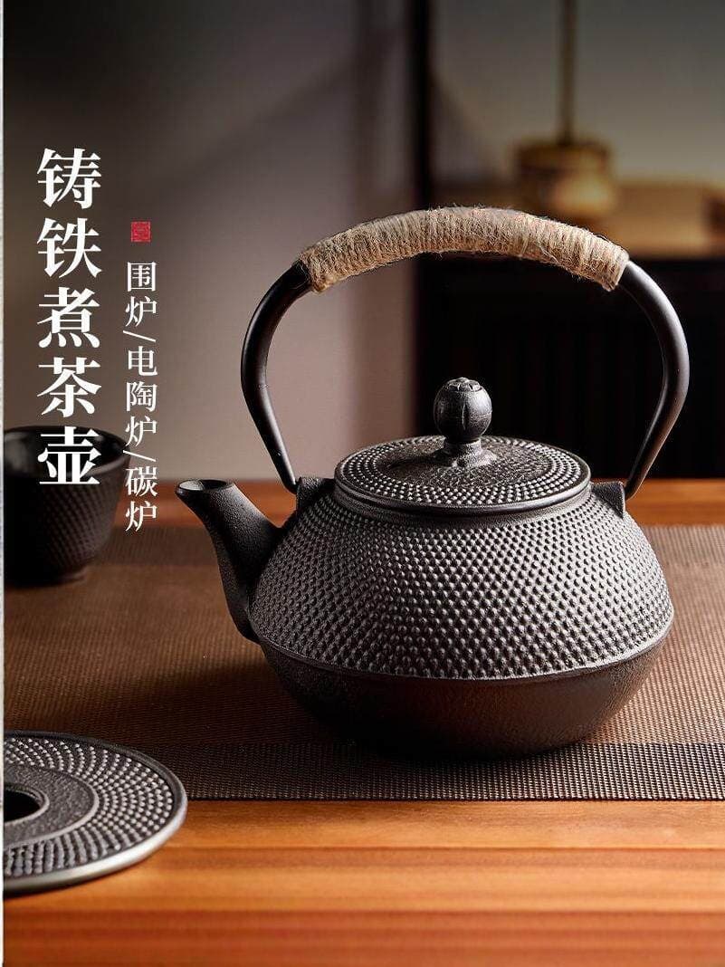Cast iron teapot open flame heating old iron kettle outdoor boiling water boiling teapot charcoal fire boiling kettle firewood stove boiling teapot