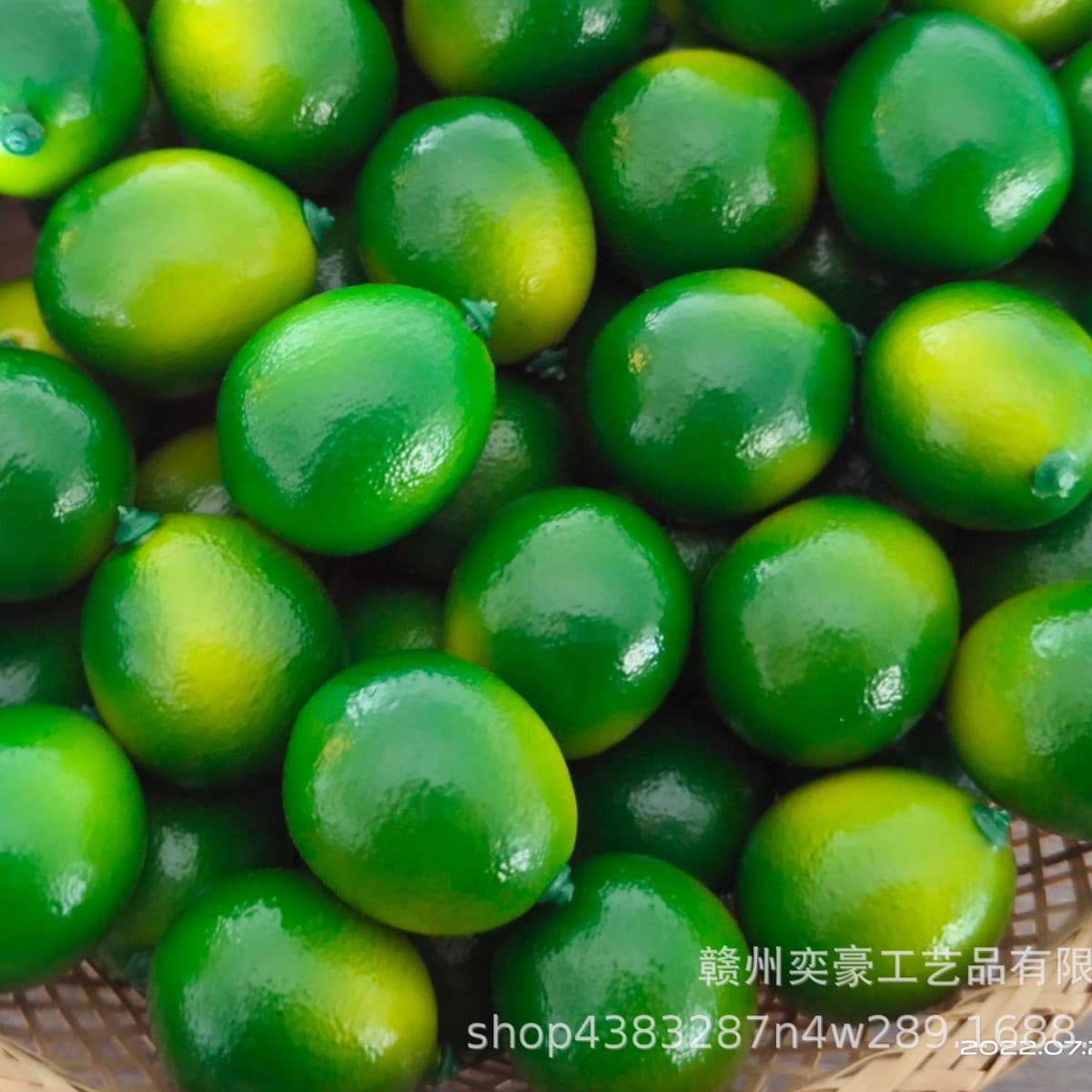 Wholesale simulated fruit models for milk tea shop window decorations, artificial Hainan small green kumquat, green orange props, small green limes