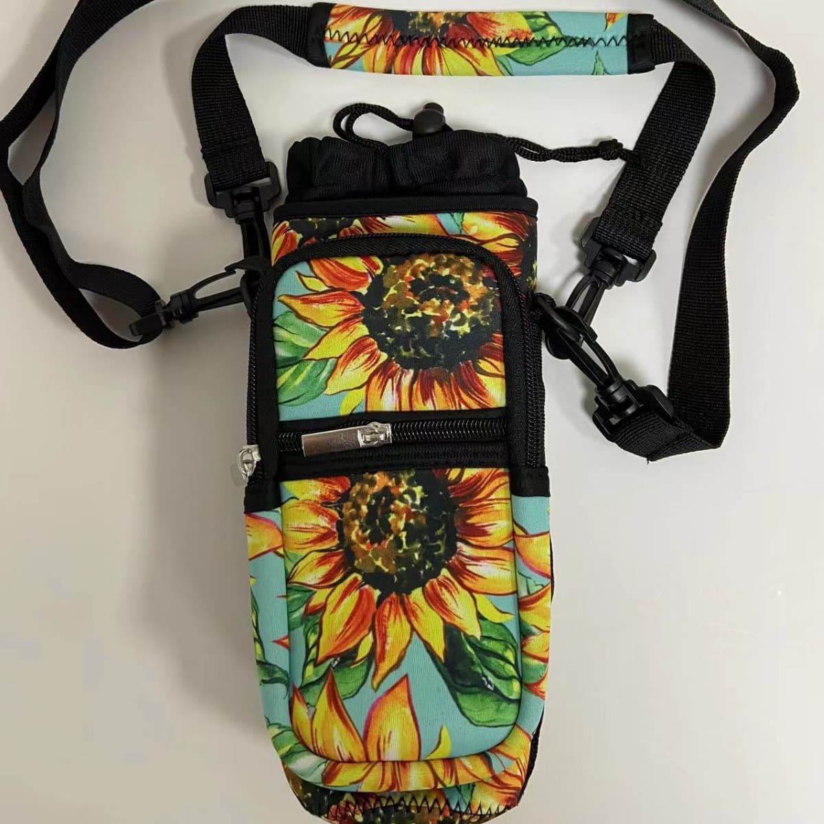Hand carry shoulder strap neoprene insulated bottle cover, phone case, key pouch.