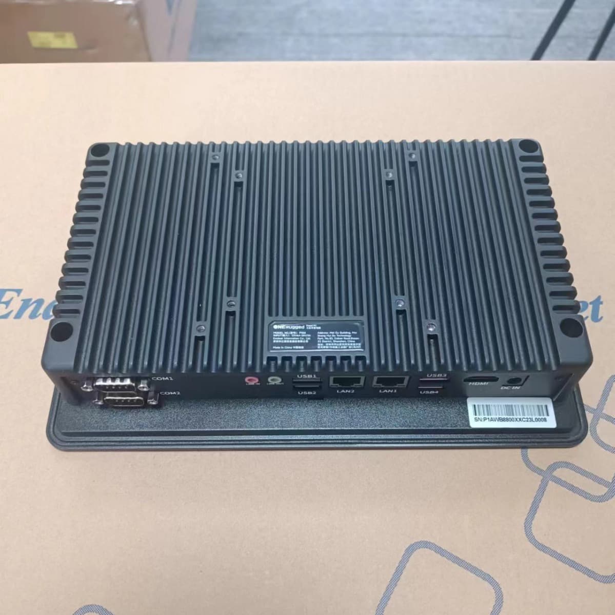 This industrial all-in-one PC features a fanless design, two gigabit Ethernet ports, four USB ports, and two COM serial ports.