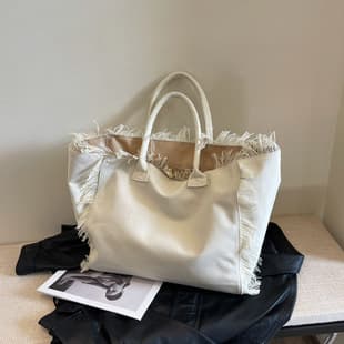 Tassel Letter Canvas Bag Large Capacity Women's 2026 New Style Solid Color Commuter Shoulder Tote Bag Cross-border Export