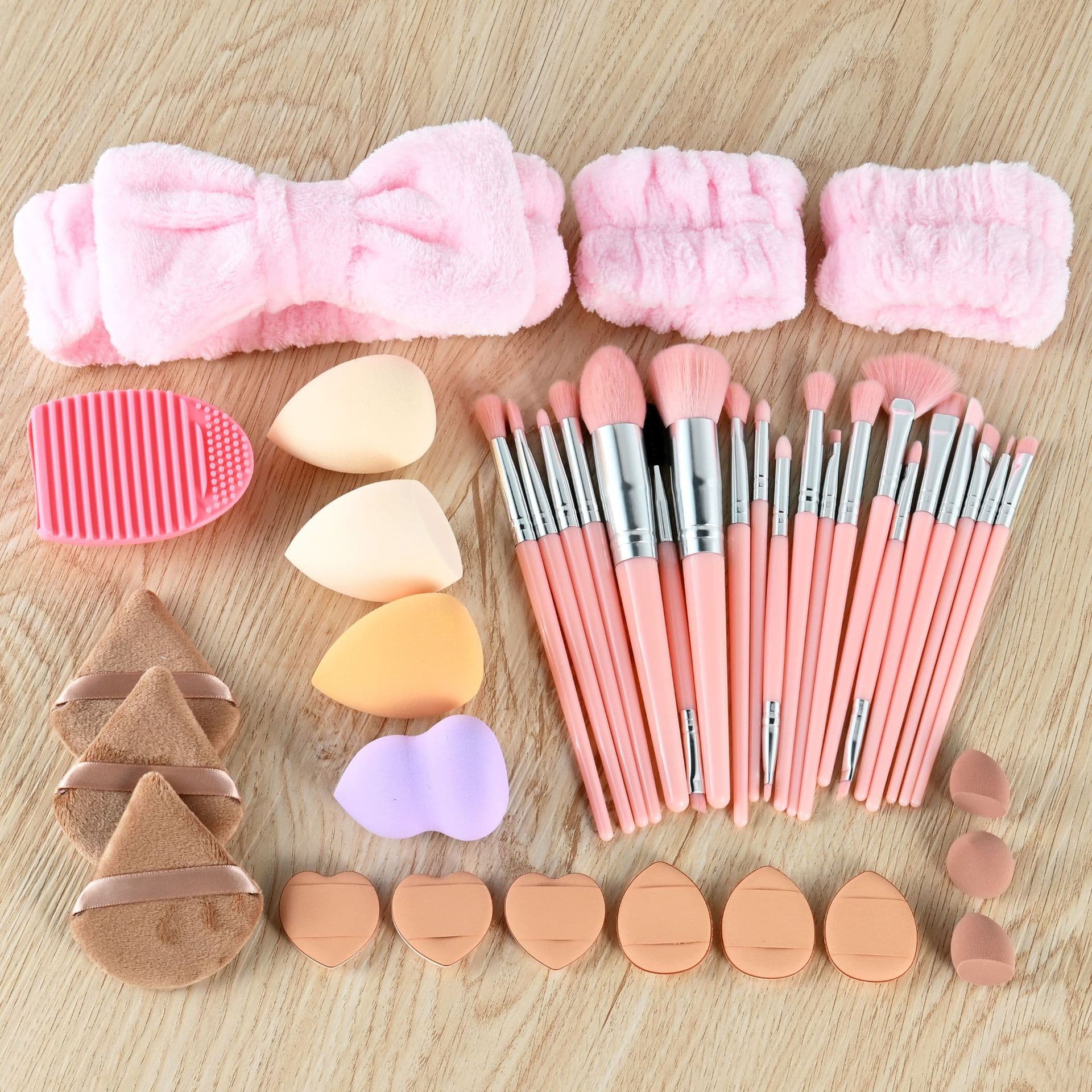 41-piece pink set of powder puff makeup brushes, a complete set of sponge powder puff makeup brushes, face wash, headband, makeup tools