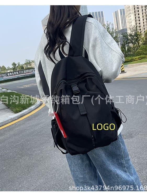 Factory direct supply of trendy brand casual backpacks, Korean style junior and high school college student school bags, simple and fashionable men's and women's travel bags
