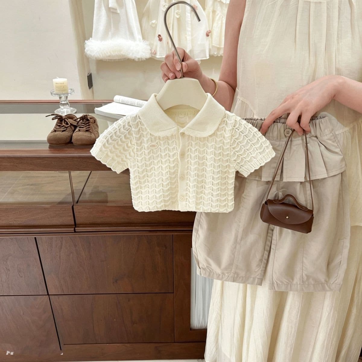 Girls summer suit 2026 new baby girl foreign style hollow knitted short-sleeved children's quick-drying butt curtain pants two-piece set